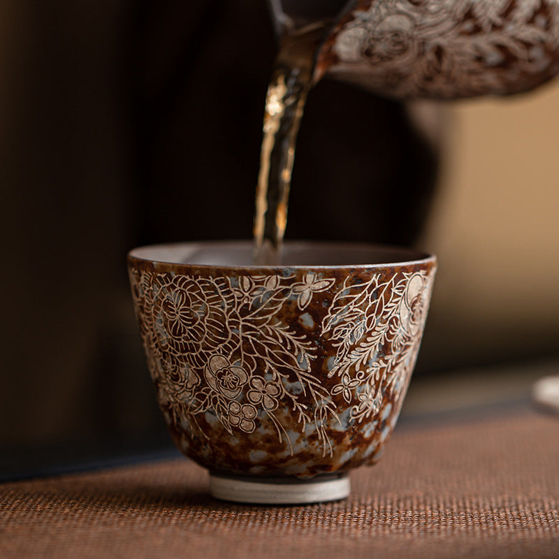 Old Rock Clay Floral Silver Gilded Teacup